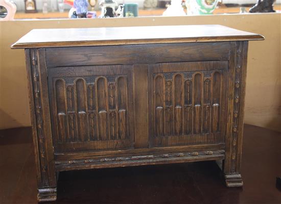 Small 17th century style oak coffer, with carved panelled front(-0